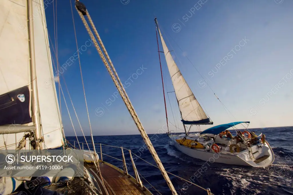 Photograph of a sail boat cruising on the Mediterranean sea