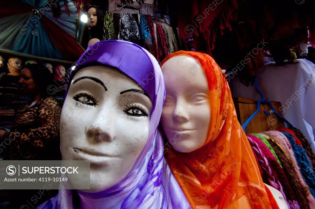 Photograph of two manikins infront of a clothing shop on the streets of Fes ,Morroco