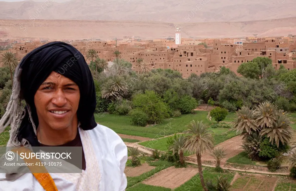 Photograph of a Moroccan man and the town of Tinerhir