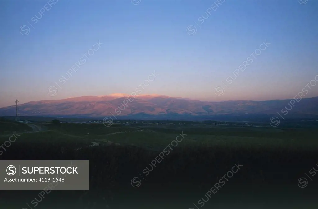 Photograph of the northern Golan Heights and mount Hermon at sunset
