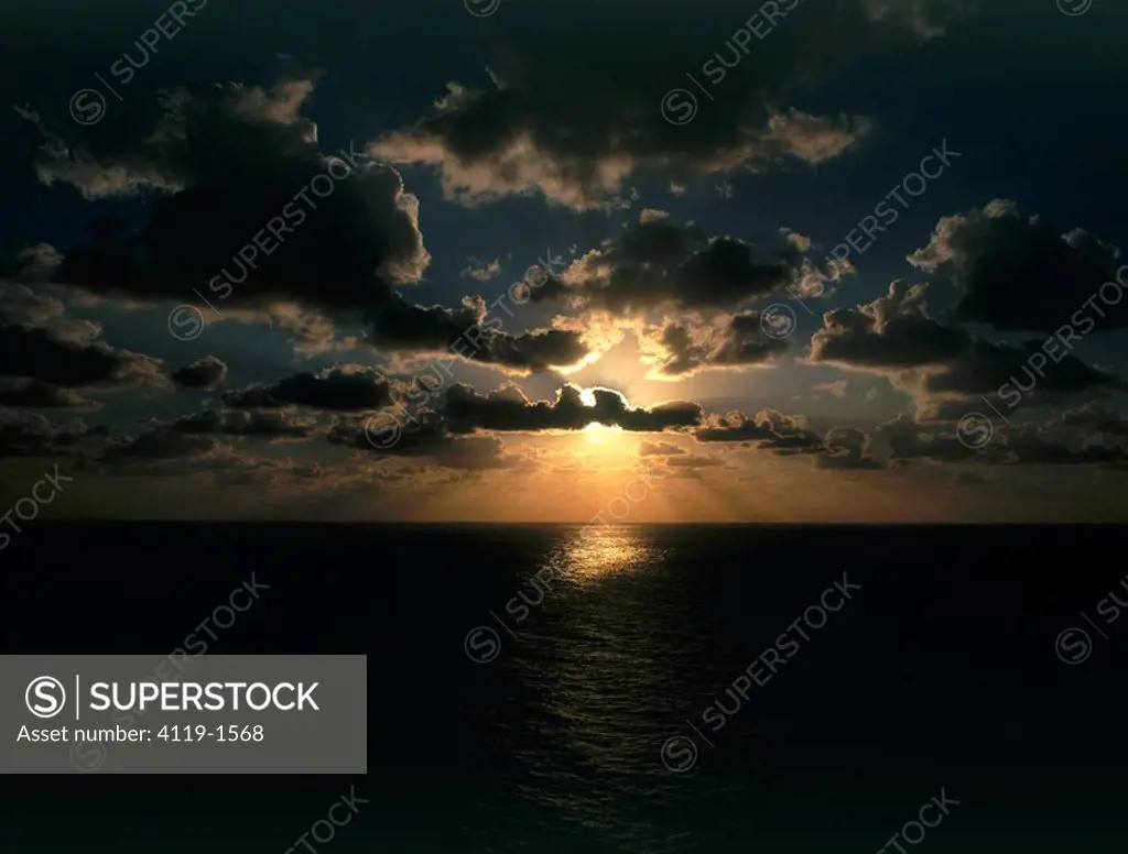Aerial photograph of the sun setting over the Mediterranean sea