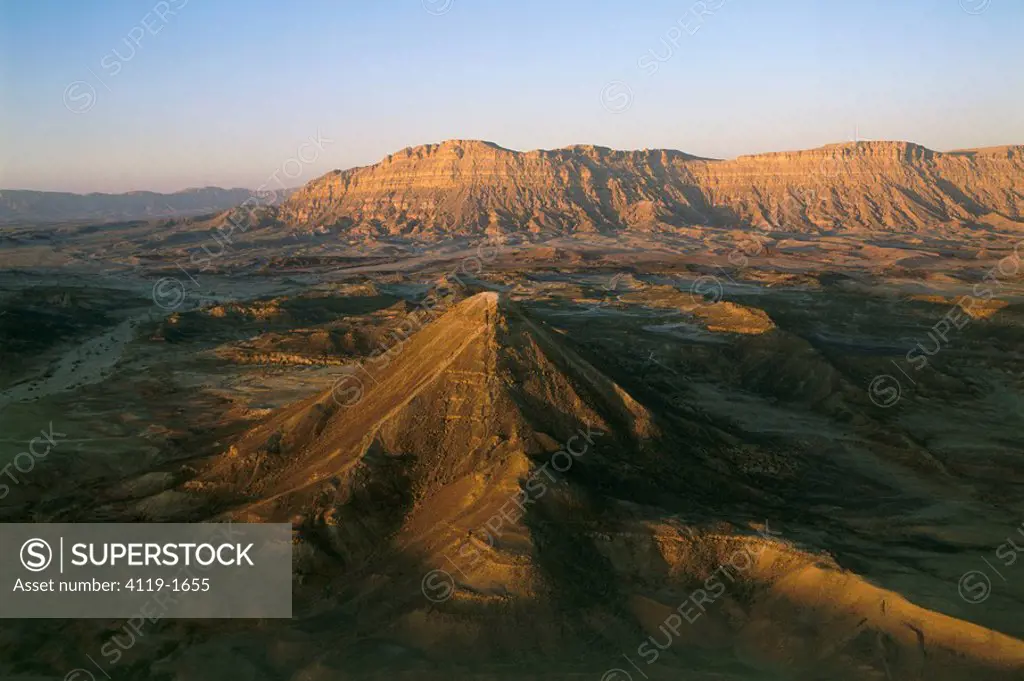 Aerial photograph of mount Ardon and the hill of Harut in the Negev desert at sunset