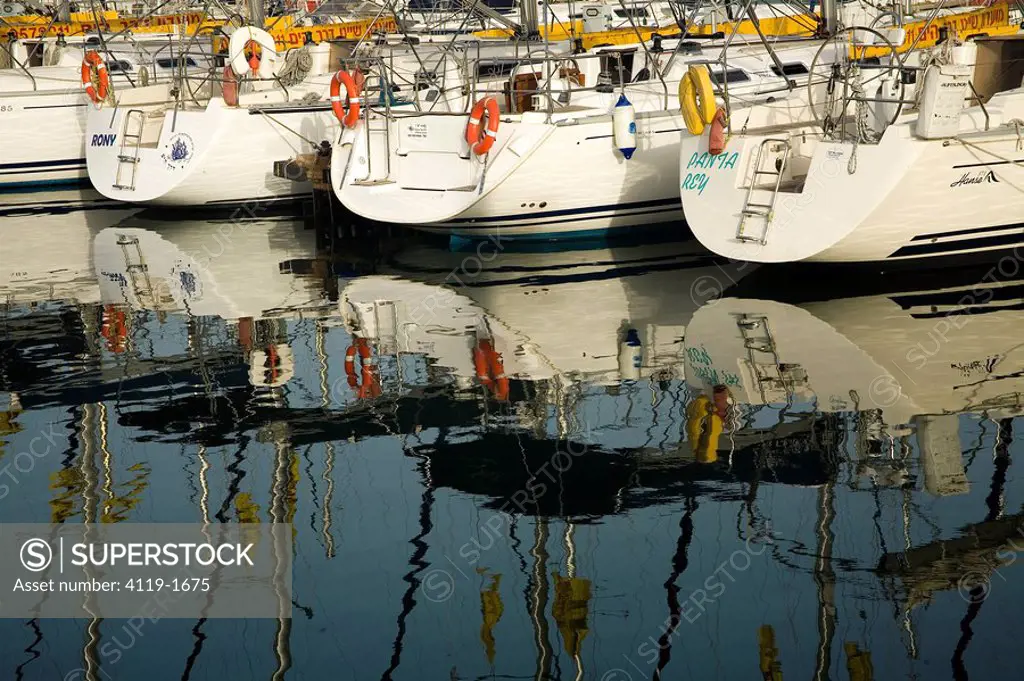 Photograph of boats and their reflection in the water at Herzeliya´s marina