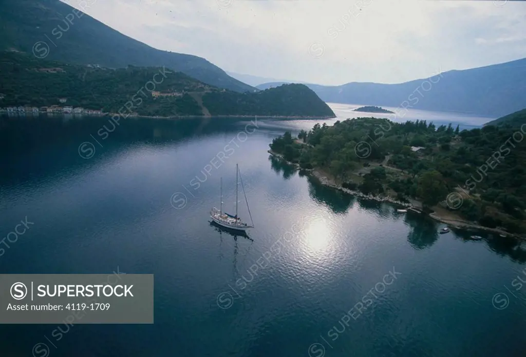 Aerial photograph of a sail boat in one of the islands of Greece