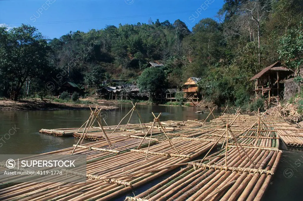 Photograph of small rafts on a river in Thailand
