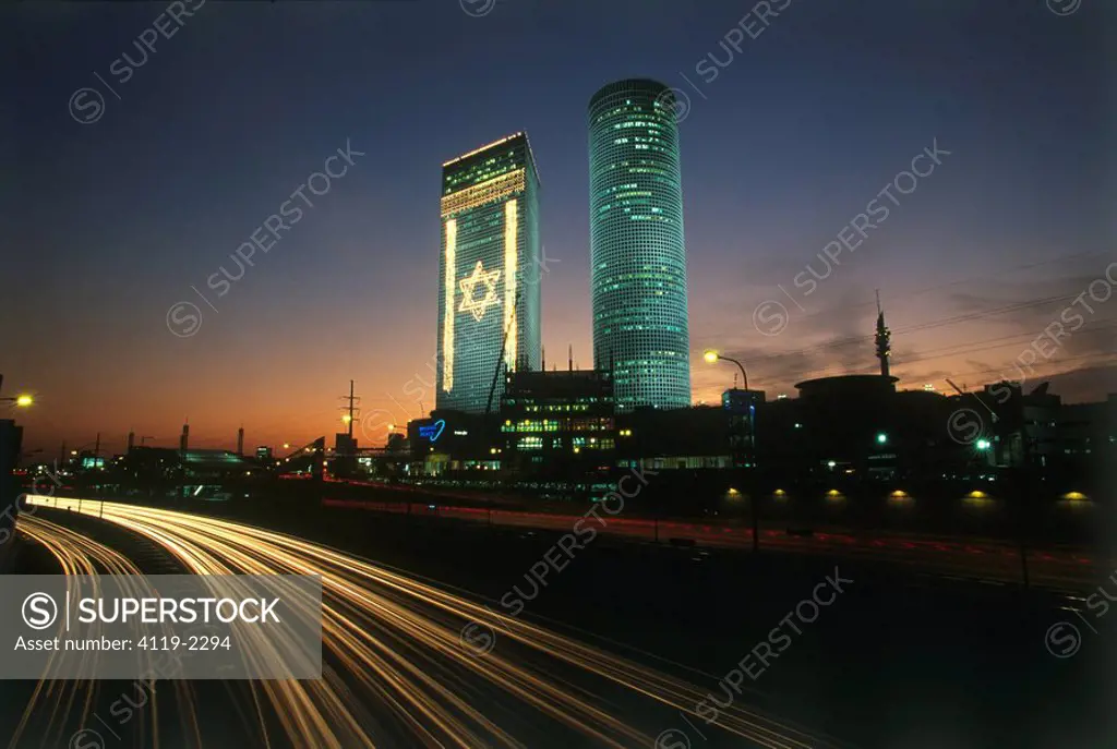 Photograph of the Azrieli towers in Tel Aviv at night