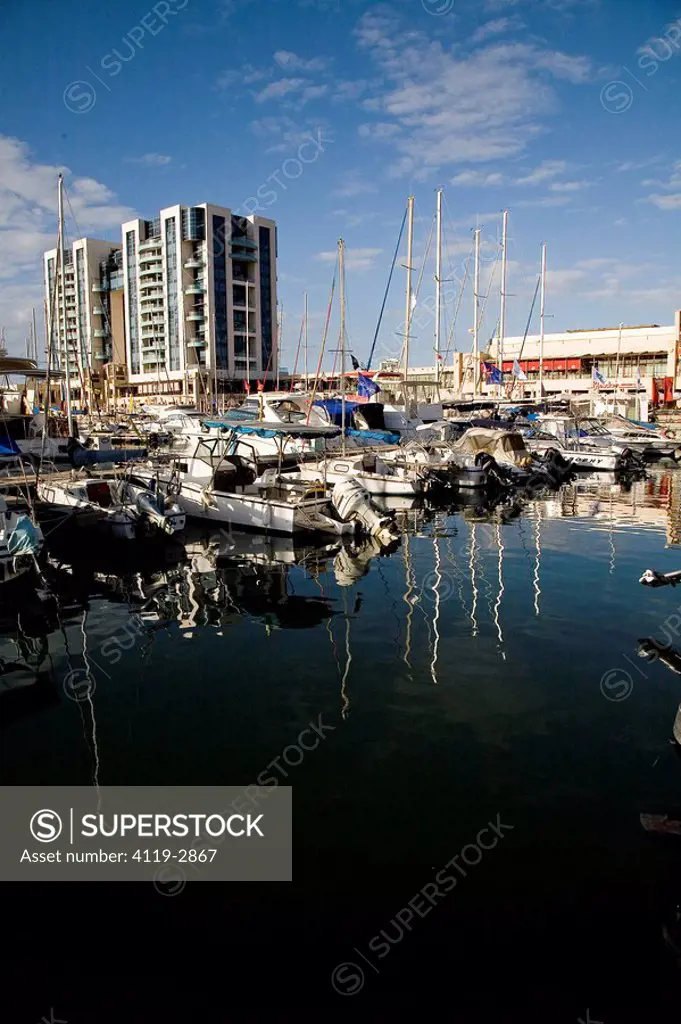 Photograph of boats and their reflection in the water at Herzeliya´s marina