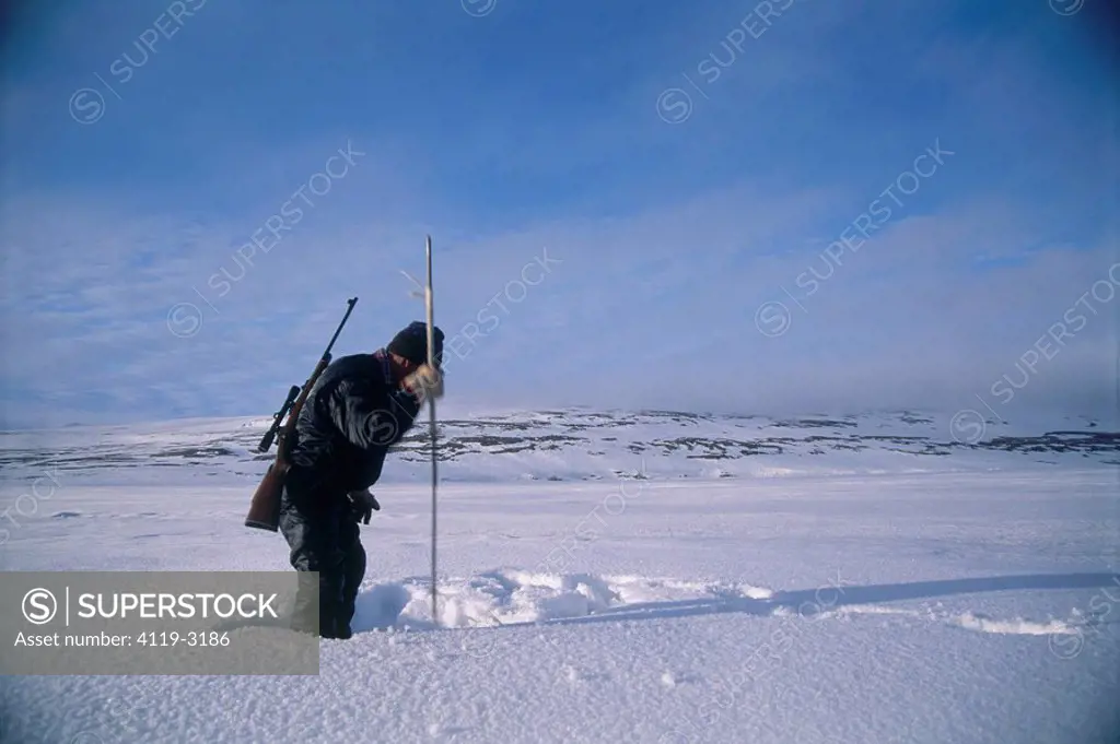 Photograph of an Eskimo hunter and the preparation for the Hunt