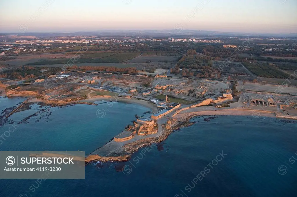 Aerial photograph of the ancient port of Caesarea at sunset