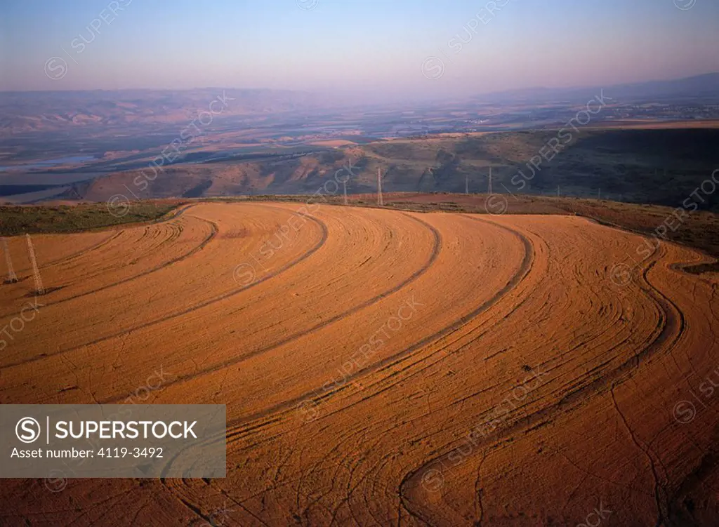 Aerial photograph of the plowed fields of Issachar Heights in the Jezreel valley at sunset