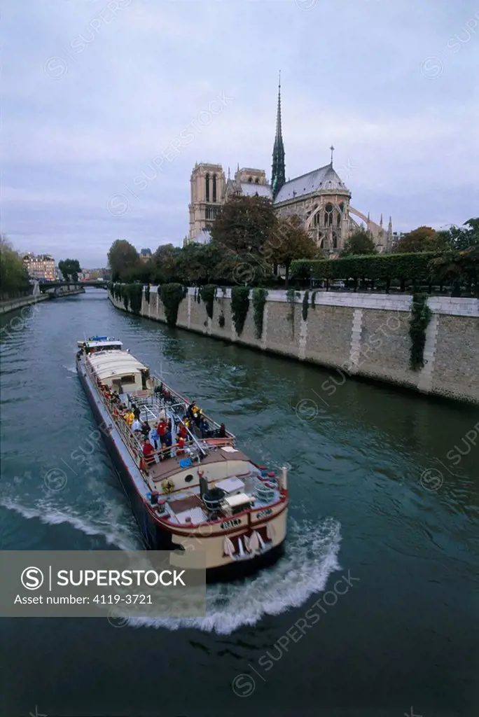 Tourists boat on the Seine river in Paris