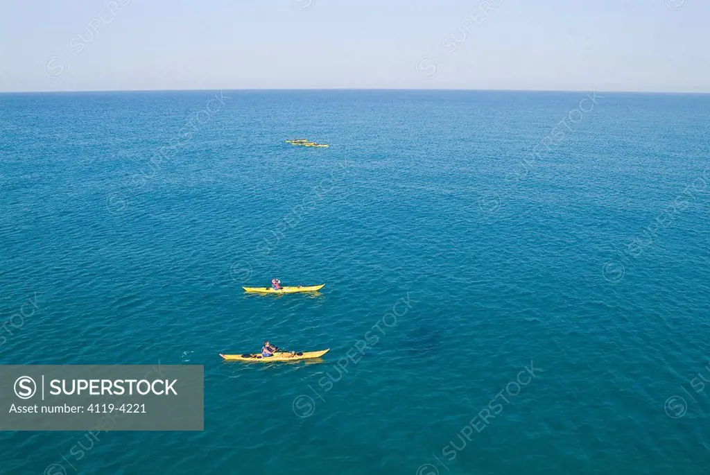 Aerial photograph of two kayaks in the mediterranean sea