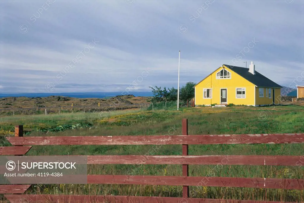 Photograph of a yellow house in Iceland