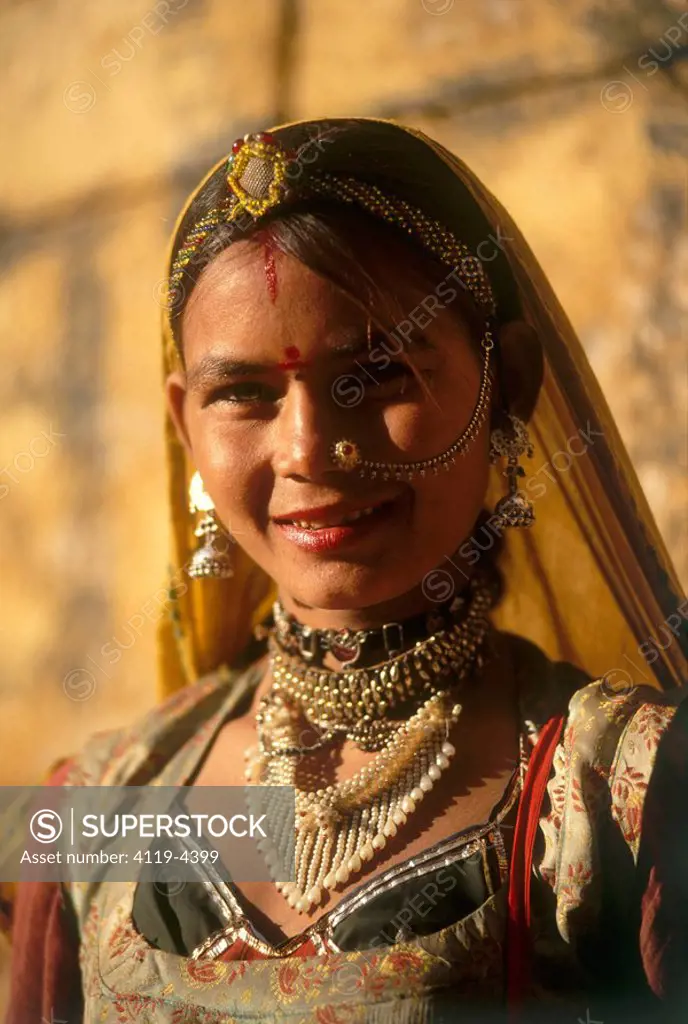 Photograph of a young Indian woman with jewelry