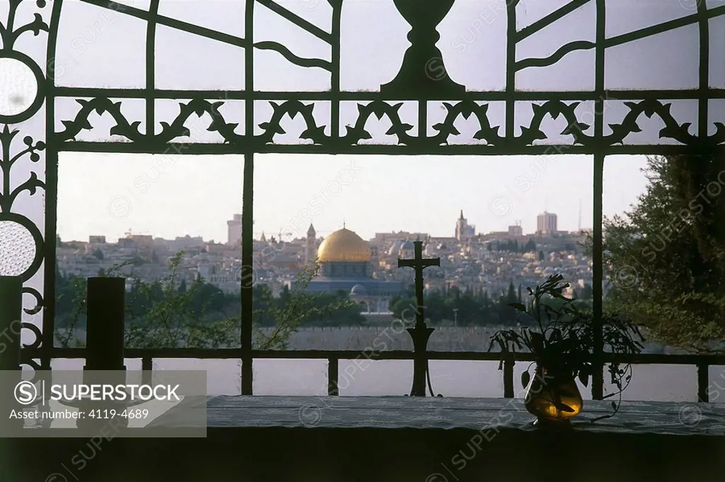 Photograph of the the view of the old city of Jerusalem from the window of the Dominus Flevit church on the mount of Olives