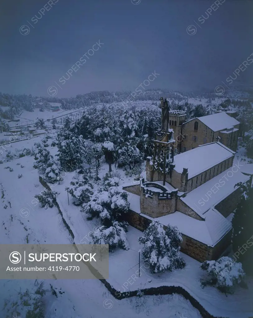 Aerial photograph of the church of Our Lady of the Ark of the Covenant at Abu Gosh on the mountains of Jerusalem at winter