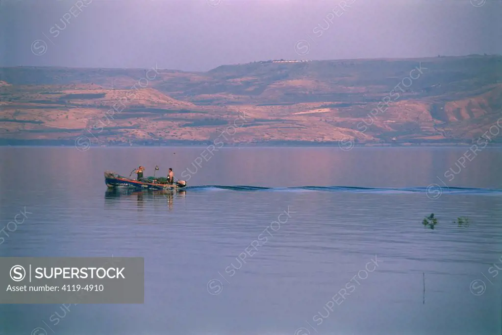 Photograph of fishermen in the Sea of Galilee