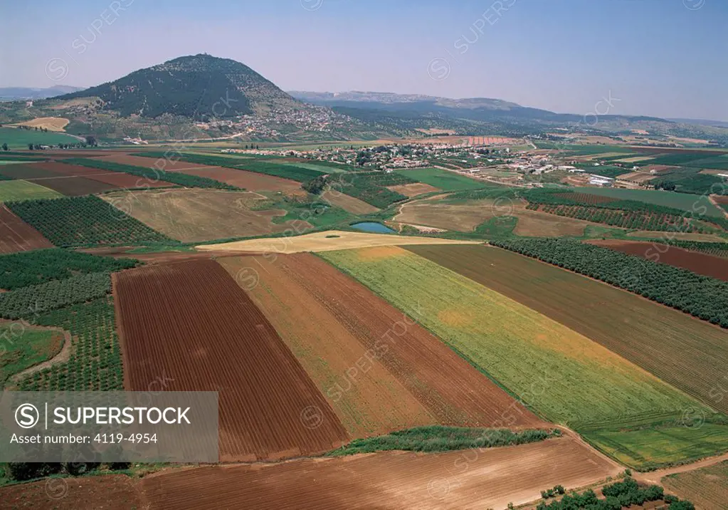 Aerial photograph of mount Tavor and the green fields Kfar Tavor in the Lower Galilee