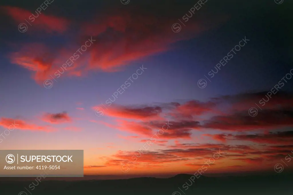 Photograph of sunrise over the Ramon crater in the Negev desert