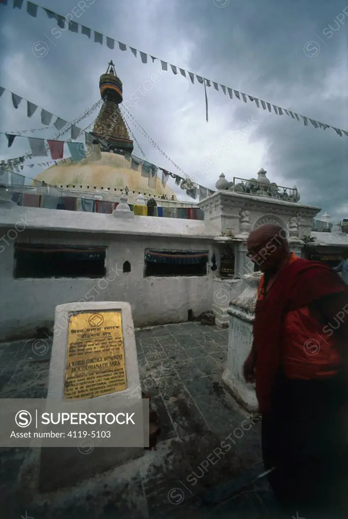 Photograph of a monk in a shrine in Nepal