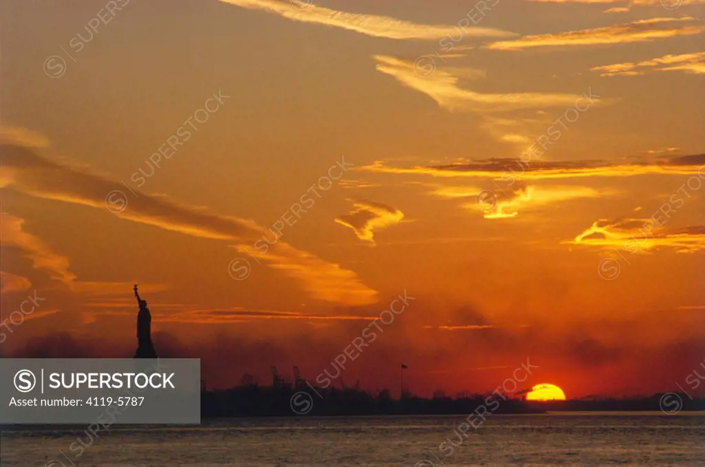 Photograph of the Statue of Liberty in New York City at sunrise