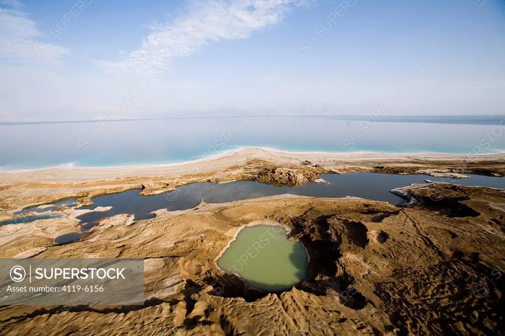 Aerial photograph of sinkholes on the shore of the Dead sea