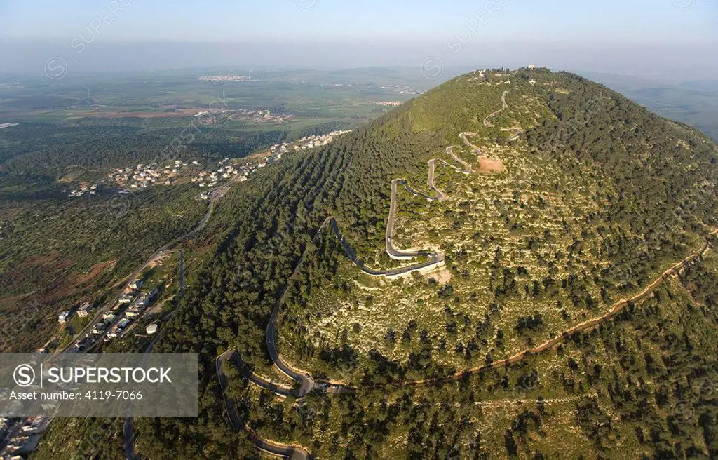 Abstract view of the road to the summit of mount Tavor in the Lower Galilee at sunrise