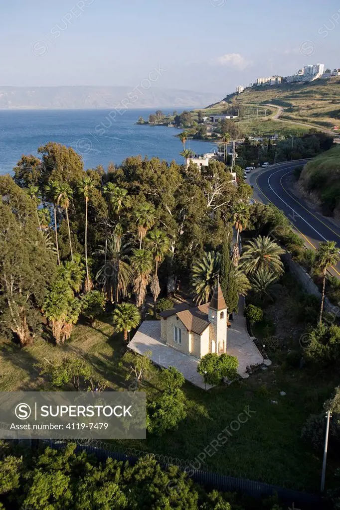 Aerial photograph of a church on the shores of the Sea of Galilee