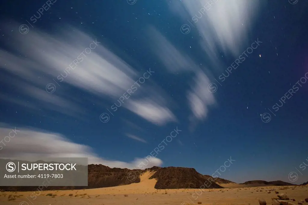 Photograph of the night sky over Wadi Ram in the Jordanian desert