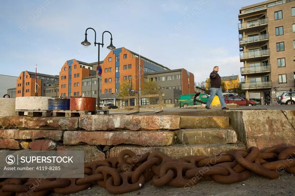 Photograph of a giant rusted chain in a Norwegian sea port