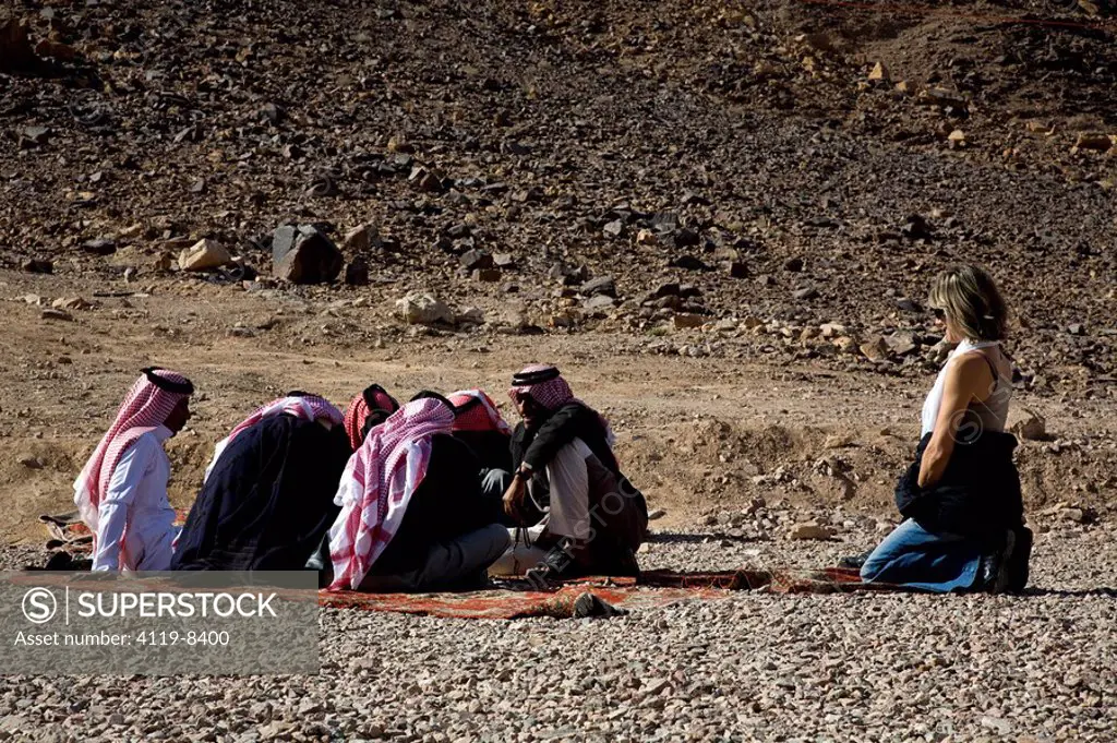 Photograph of Beduin men in the Jordanian desert