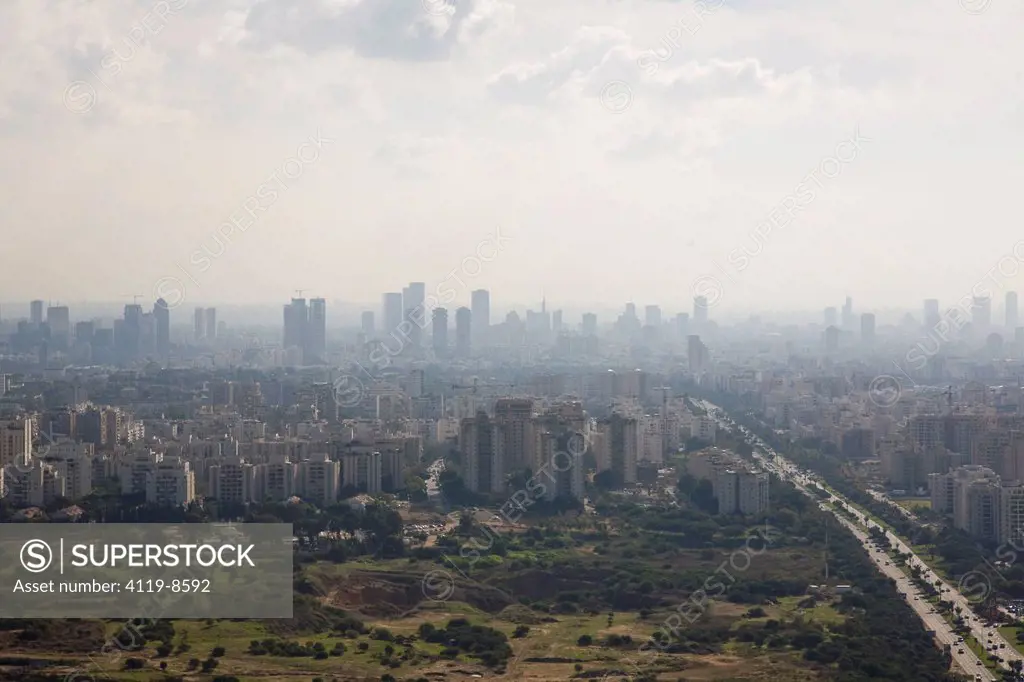Aerial photograph of northern Tel Aviv coverd with smog