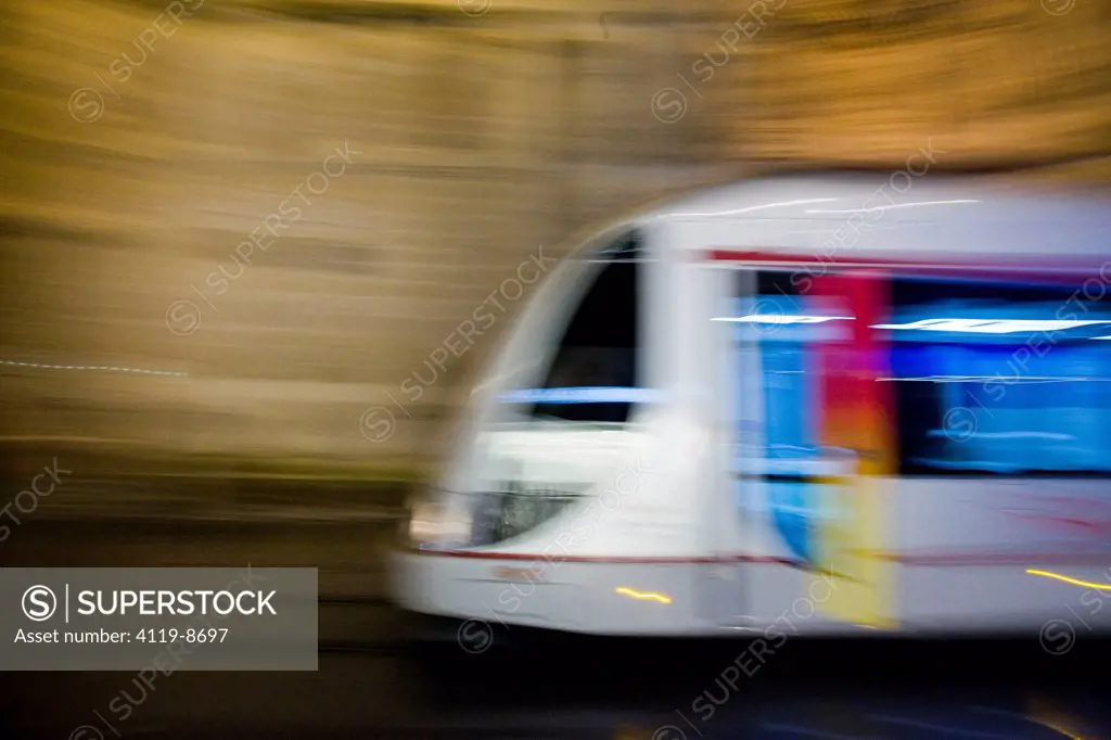 Night shot of the light rail transit in Seville, Andalusia __ an autonomic territory in Spain