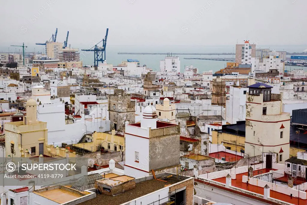 Photograph of the uniqoe colorful roofs of the Spanish city of Cadiz