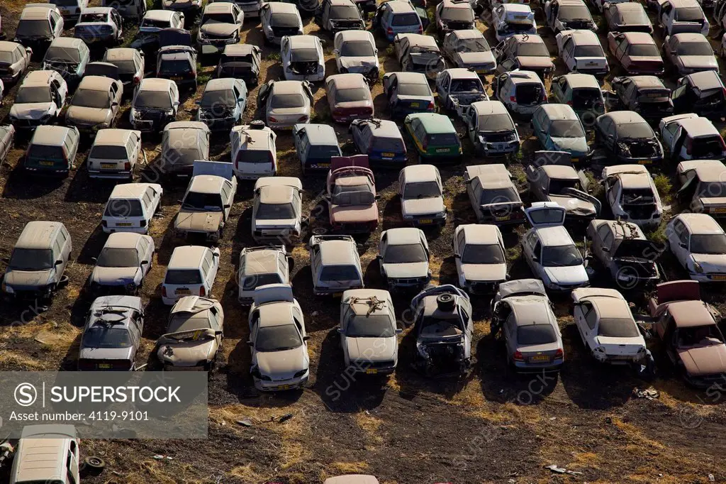 Aerial photo of ruined cars in a parking lot in the North Negev