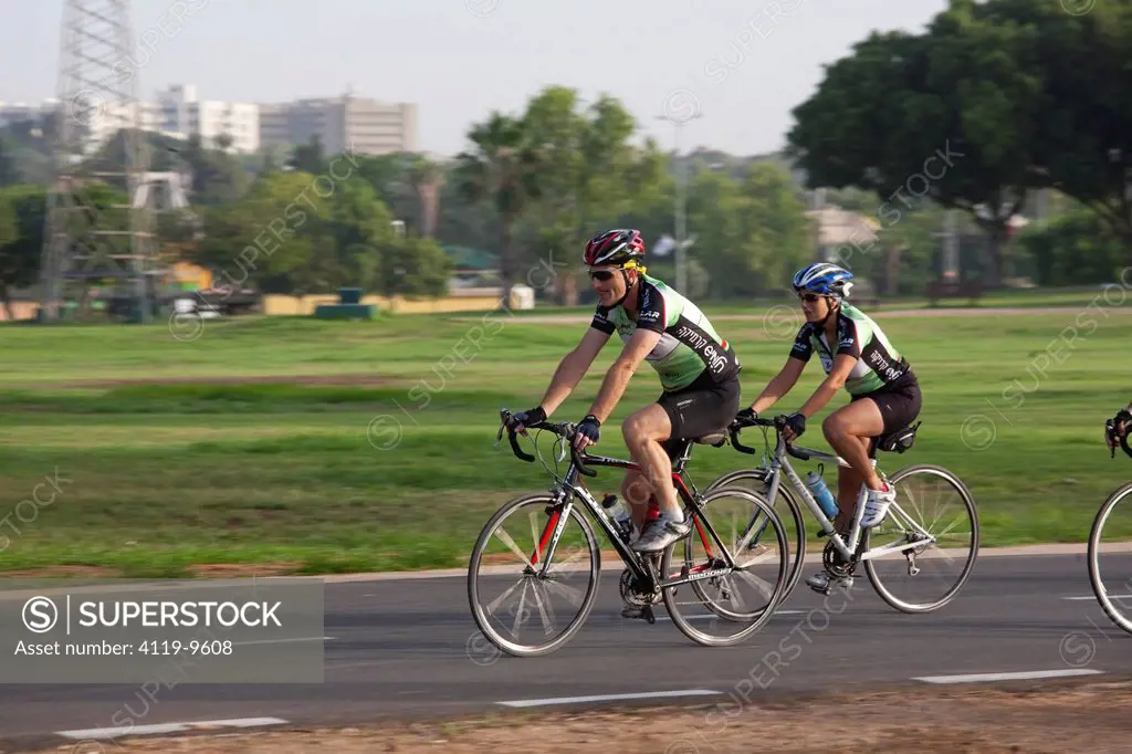 Photograph of bicycle riders in the Yarkon Park _ the green lungs of the city of Tel Aviv