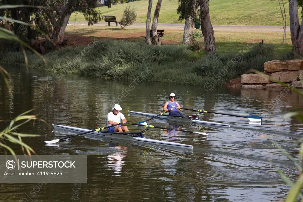 Photograph of kayakers on the poluted Yarkon stream