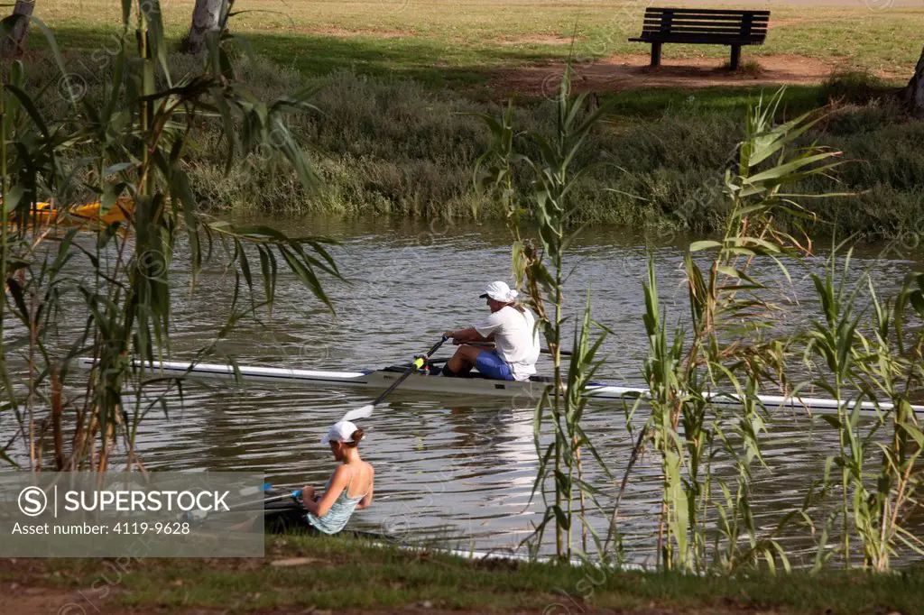 Photograph of kayakers on the poluted Yarkon stream