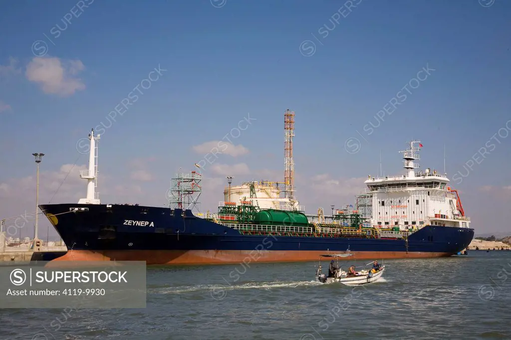 Photograph of a cargo ship in the port of Haifa