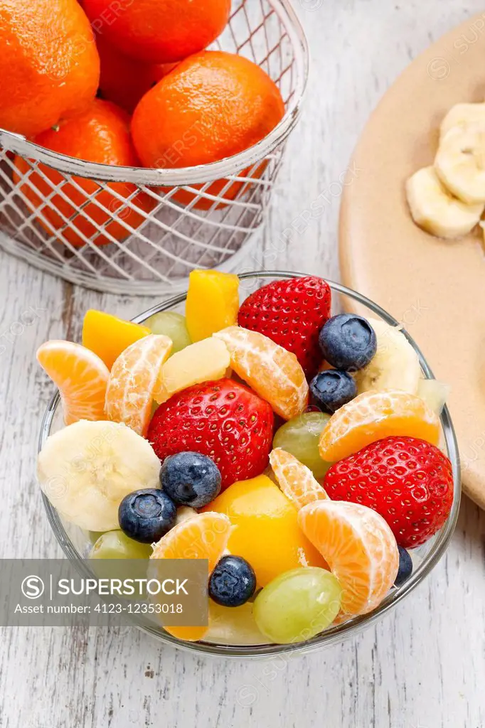 Fruit salad in glass bowl. Healthy food