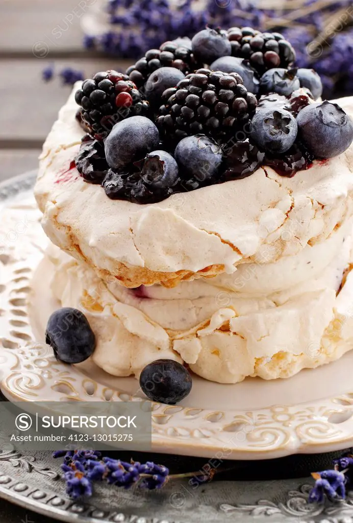 Pavlova cake with blueberries and blackberries Party dessert