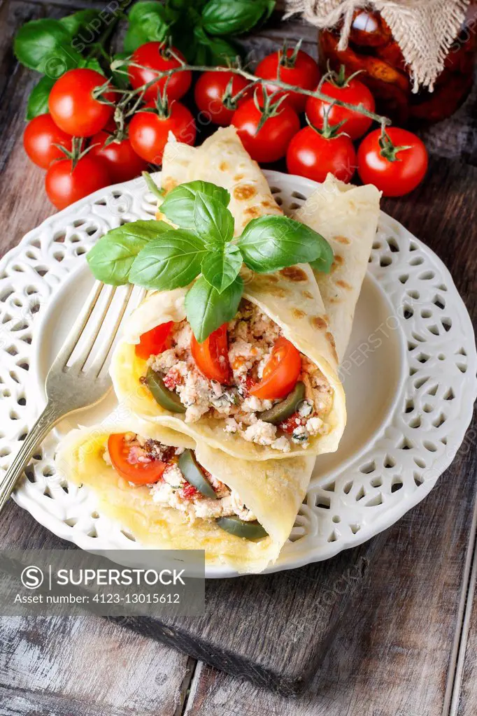 Mediterranean cuisine: crepes stuffed with cheese and vegetables. Healthy food