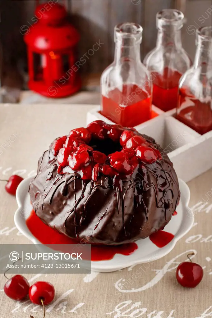 Chocolate cake with cherries. Party dessert