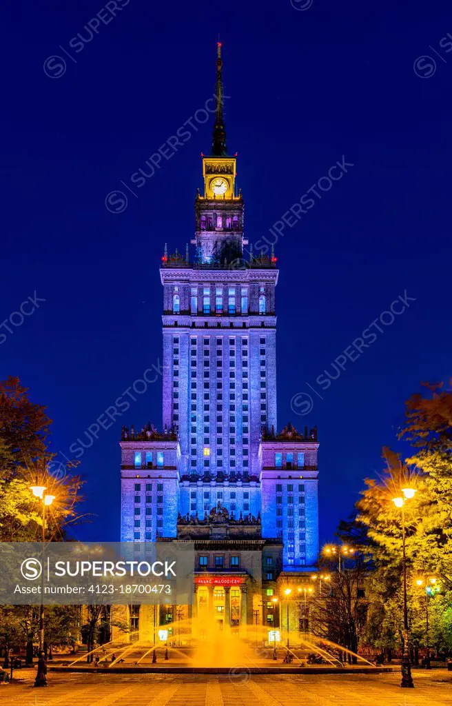 Warsaw, Poland - May 11, 2021: Night view of Culture and Science Palace, Palac Kultury i Nauki, tower and park in Srodmiescie city center district