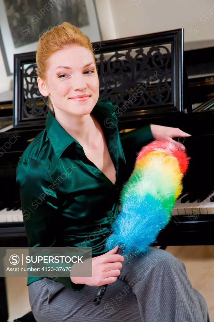 Woman with a feather_duster.