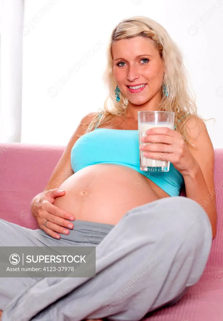 Pregnant woman spending free time.