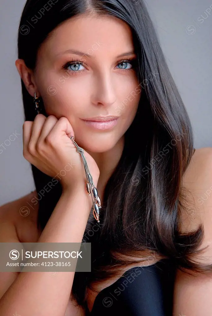 Young woman portrait with jewellery.