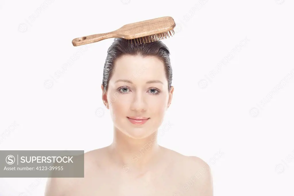 Woman brushing her hair.