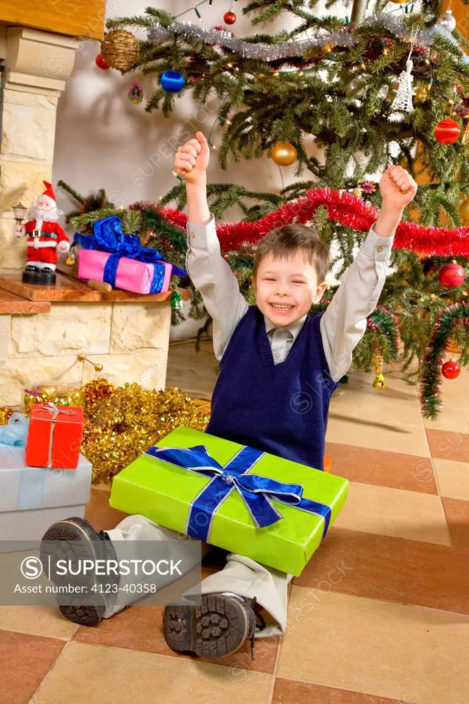 Boy with Christmas presents.