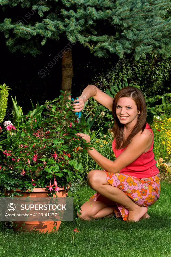 Woman working in garden.